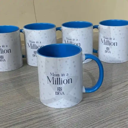 White ceramic mug with “Moments with Mom” printed in elegant typography, perfect for gifting mothers.