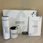 Momentum Productivity Kit featuring a bottle, mug, notebook, and keychain