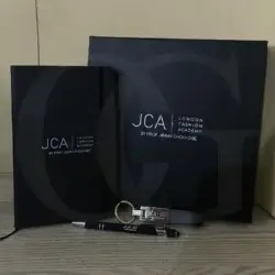 Elite Impact Box – premium corporate gift set with notebook, metal pen, and keychain in elegant packaging.