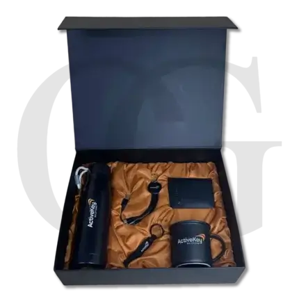 The Influence Box – premium corporate gift set with notebook, pen, and keychain for professionals.