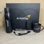 The Influence Box – premium corporate gift set with notebook, pen, and keychain for professionals.