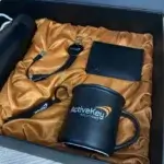 The Influence Box – premium corporate gift set with notebook, pen, and keychain for professionals.