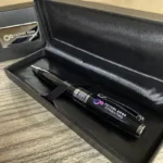 The Signature Touch – premium corporate gift set with notebook, pen, and elegant packaging for professionals.