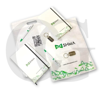 Team Motivation Pack including a pen, keychain, custom paper bag, and notebook, designed to inspire and energize teams