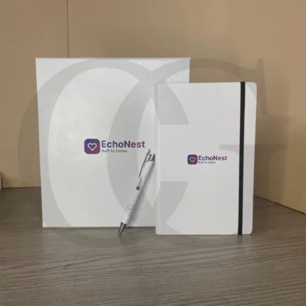 Team Spirit Box with a pen and notebook, designed to motivate and inspire teams in the workplace