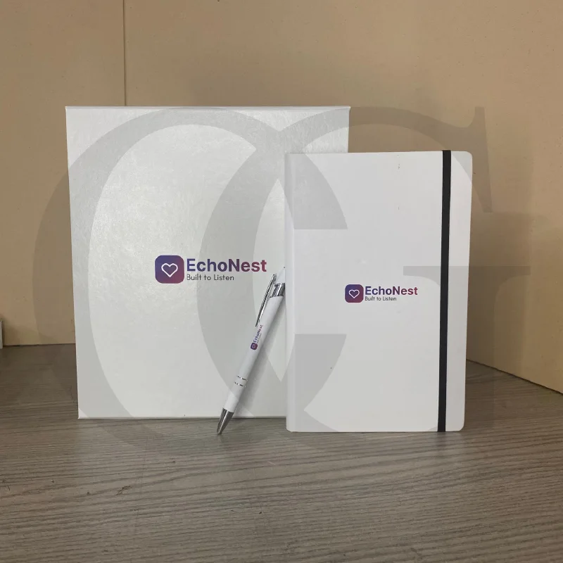 Team Spirit Box with a pen and notebook, designed to motivate and inspire teams in the workplace